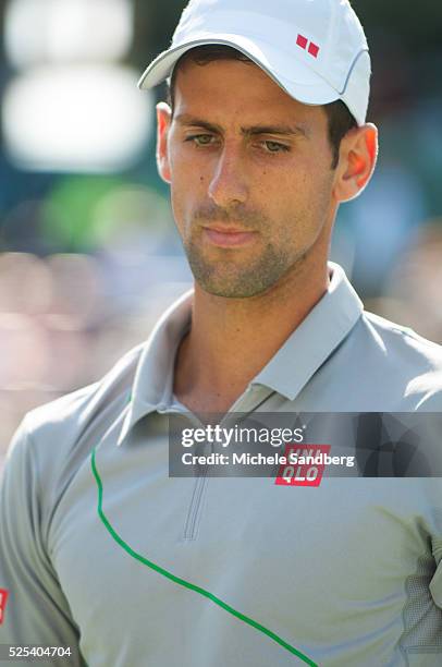 Novak Djokovic of Serbia playing against Andy Murray of Great Britain during their match on Day 10