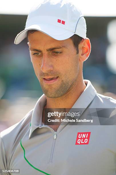 Novak Djokovic of Serbia playing against Andy Murray of Great Britain during their match on Day 10