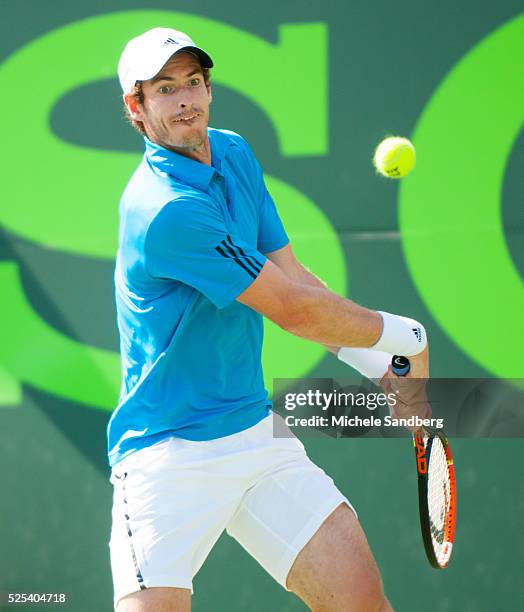 Andy Murray returns a backhand against Novak Djokovic of Serbia during their match on Day 10