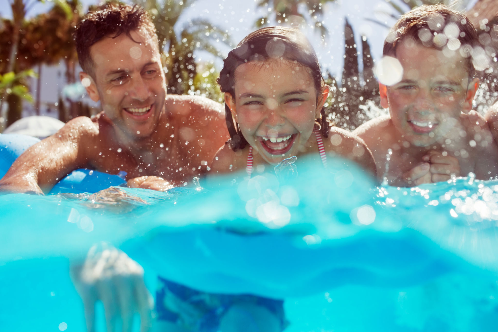 happy family swimming