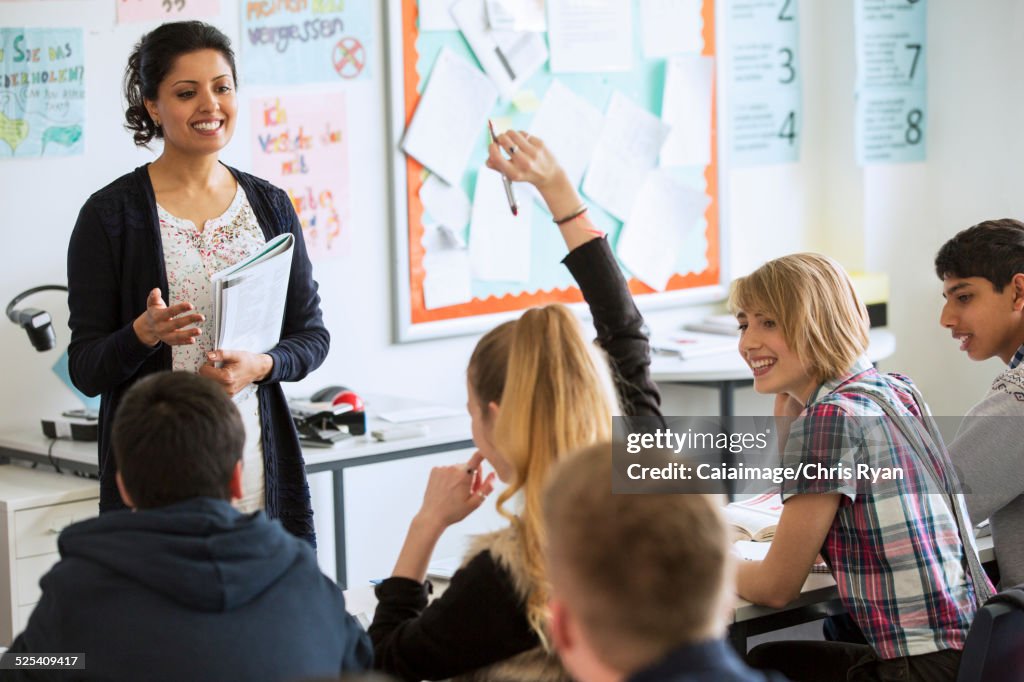 Teenage students learning in classroom