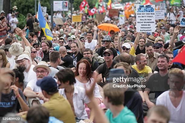 On a day of nationwide demonstrations against NSA spying all over Germany, around 1000 activists protest in Frankfurt, Germany. Protesters also show...