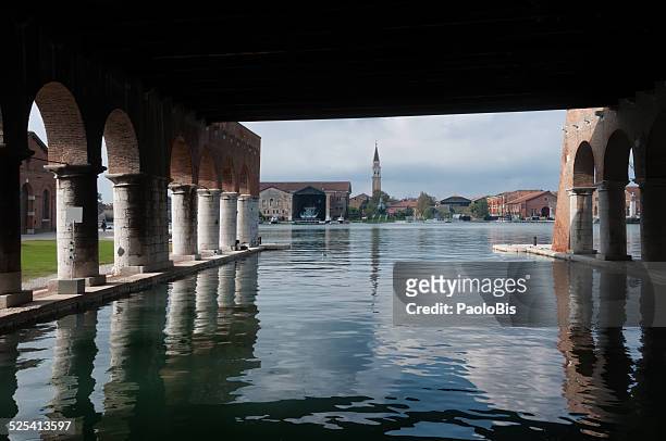 arsenale of venice from under the gagg - armory stock-fotos und bilder