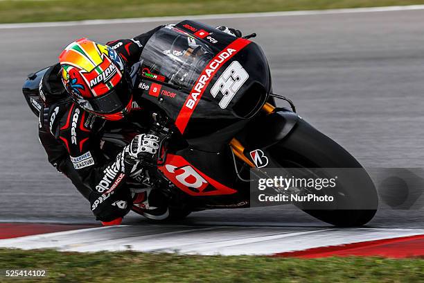 Italian Marco Melandri of Factory Aprilia Gresini in action during day one Sepang MotoGP test at Sepang International Circuit near Kuala Lumpur,...