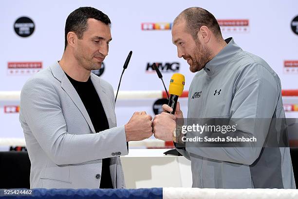 Tyson Fury and Wladimir Klitschko react during their head to head press conference on April 28, 2016 in Cologne, Germany. Fury v Klitschko Part 2...