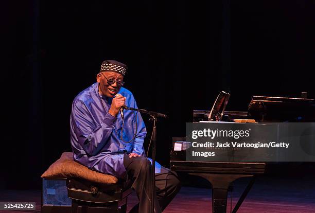 American Jazz composer and band leader Randy Weston plays piano as he leads the African Rhythms Orchestra during a concert in celebration of Jame...