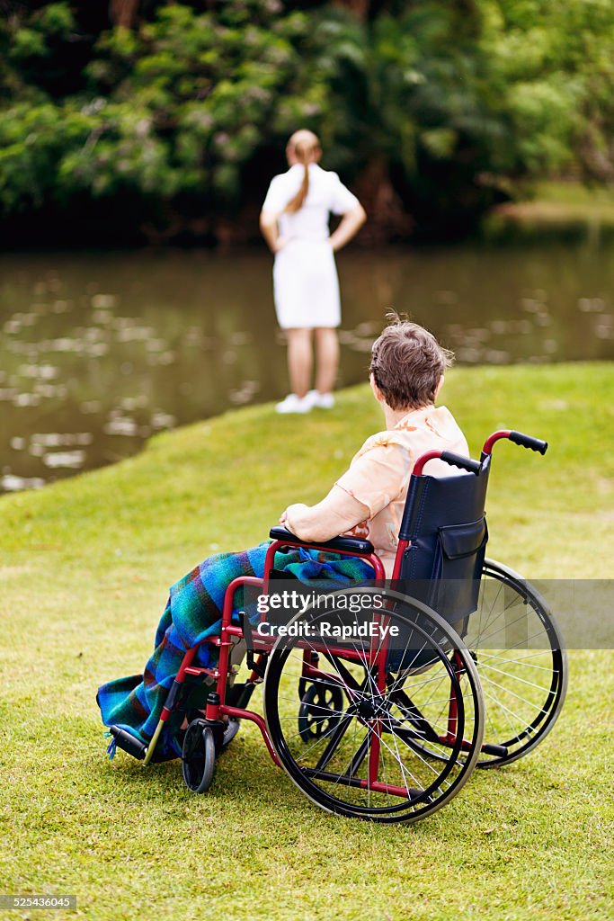 Nurse looks unsuccessfully for way across water for wheelchair-bound patient