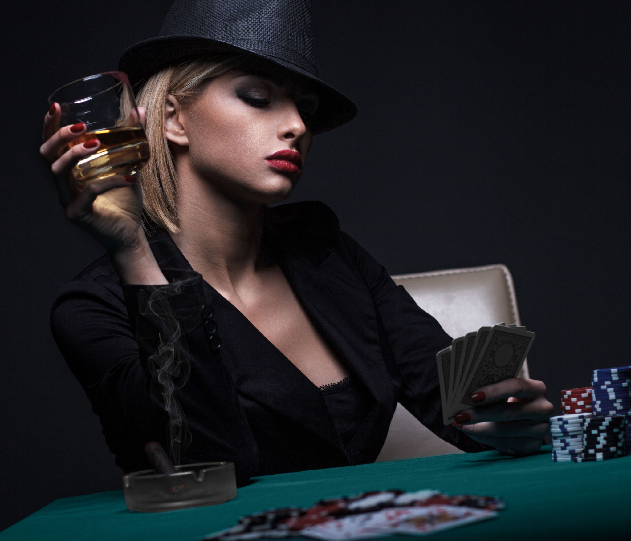 Beautiful young woman playing poker Beautiful young woman playing poker