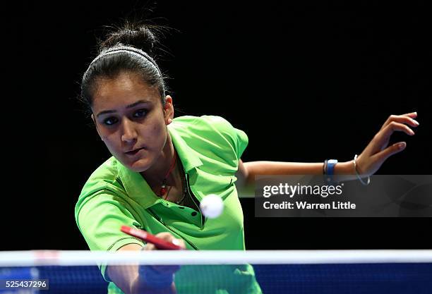 Manika Batra of India in action against Suthasini Sawettabut of Thailand during day one of the Nakheel Table Tennis Asian Cup 2016 at Dubai World...