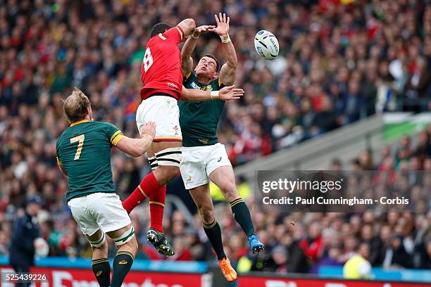 Taulupe Faletau competes with Jesse Kriel for the high ball during the IRB RWC 2015 Quarter Final match between Wales v RSA South Africa at...