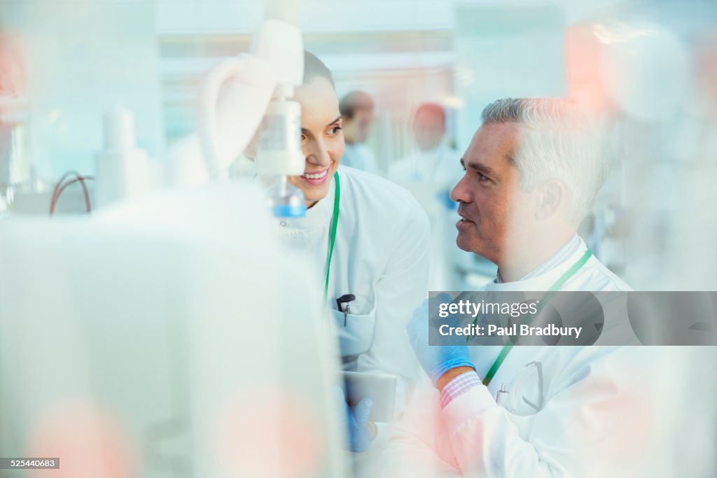 Scientists working in laboratory