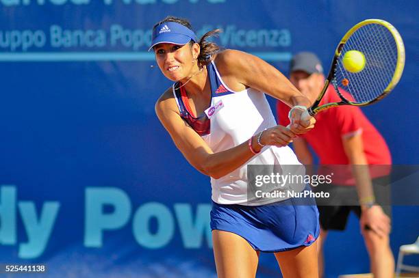 Nastassja Burnett hitting a backhand during her opening match at the WTA XXVI Italiacom Tennis Open in Palermo, on July 11, 2013. Photo: Guglielmo...