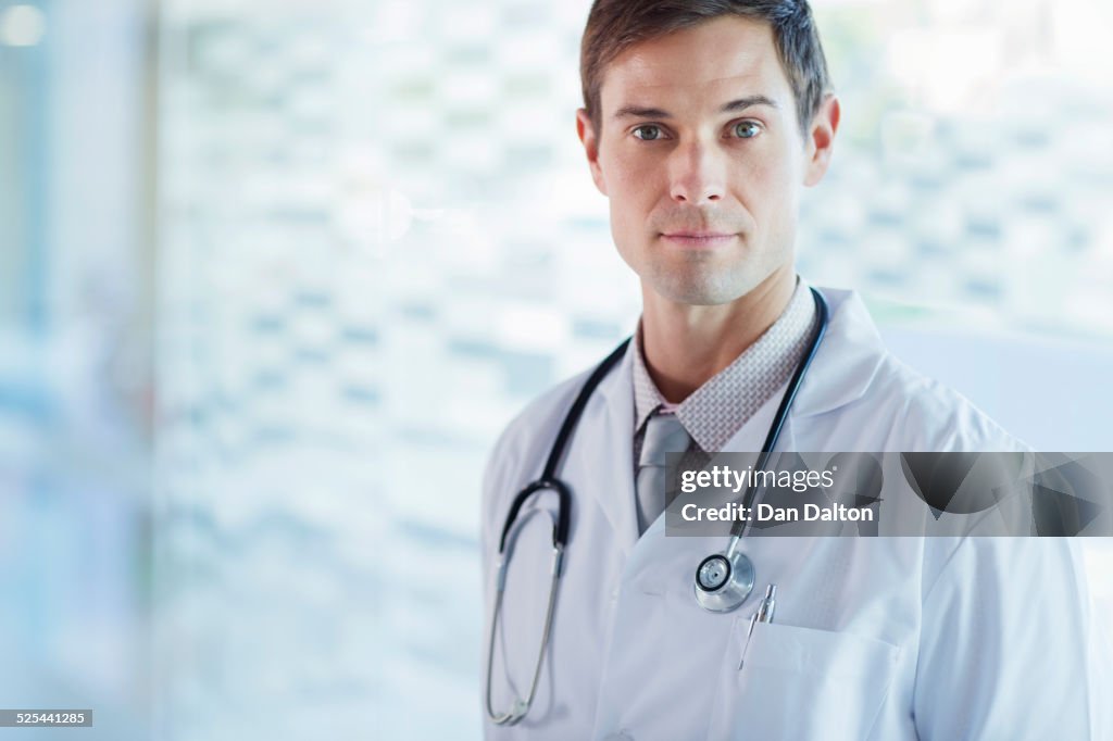 Portrait of confident doctor wearing lab coat