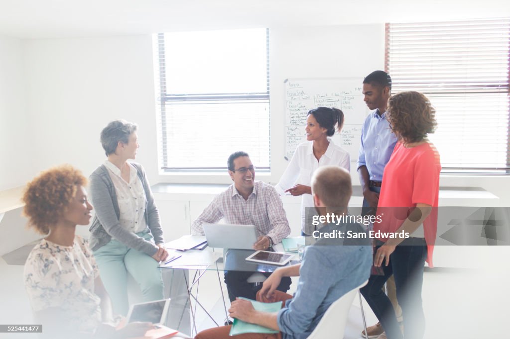 Group of business people having meeting in modern office