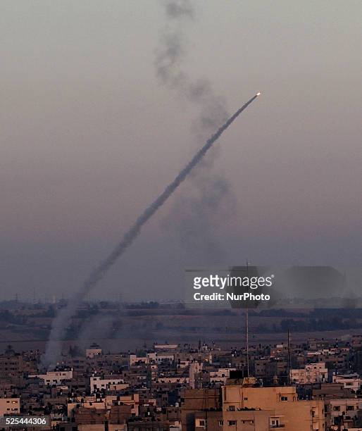 An M75 rocket is launched from the Gaza strip into Israel by militants of Ezz Al-Din Al Qassam militia, the military wing of Hamas movement, in Gaza...