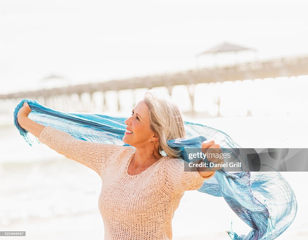 USA, Florida, Jupiter, Senior woman on beach