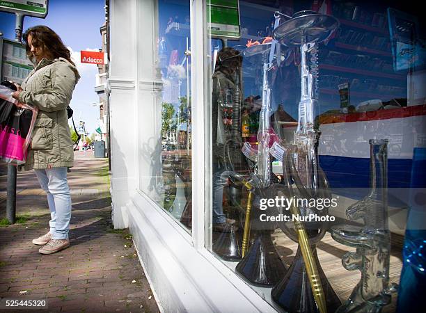 Shop selling water pipes in the shape of the popular AK 47 automatic rifle is seen in the central part of the city. According to shop owner Ali Reza...