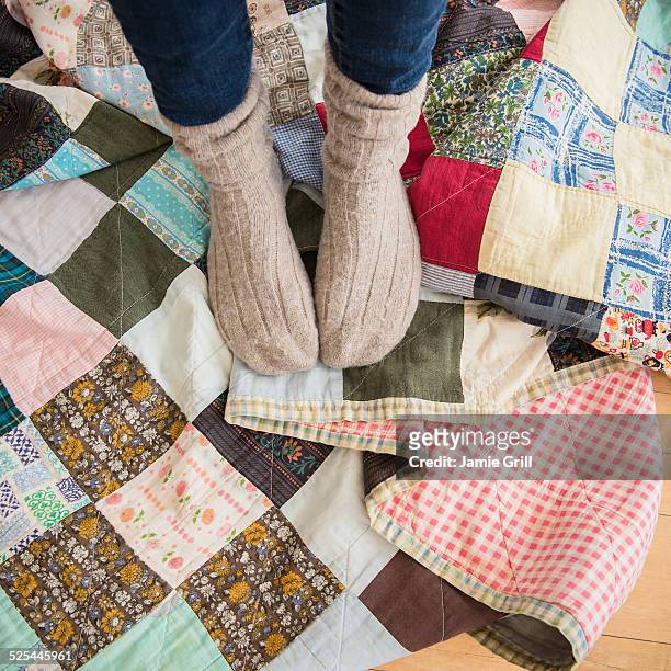 usa, new jersey, jersey city, elevated view of woman's legs wearing woolen socks - lower house stock pictures, royalty-free photos & images