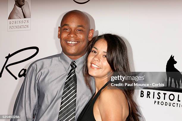 Actor Bokeem Woodbine of the film "Ray" and his wife arrive at the concert extravaganza "Genius: A Night For Ray Charles."