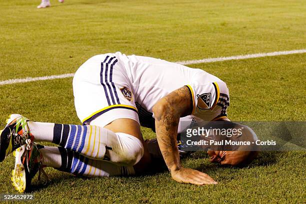 Rafael Garcia writhes on the ground in pain during the Los Angeles Galaxy vs Club America match of the International Champions Cup presented by...