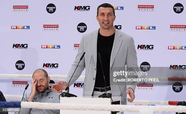 Ukrainian boxer Wladimir Klitschko and British heavyweight world champion Tyson Fury give a press conference in Cologne, western Germany, on April 28...