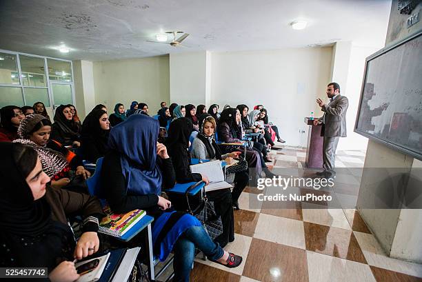 Female law class in Mashal institute of higher education, Kabul, Afghanistan. Since 2002, the end of Taliban era in Afghanistan, number of female...