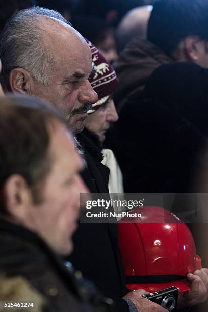 Tens of thousands of people walk a mourning during the funeral procession of the activist Mikhail Zhiznevsky, in Kiev, on Jan. 26, 2014 which was...