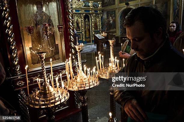 Tens of thousands of people walk a mourning during the funeral procession of the activist Mikhail Zhiznevsky, in Kiev, on Jan. 26, 2014 which was...