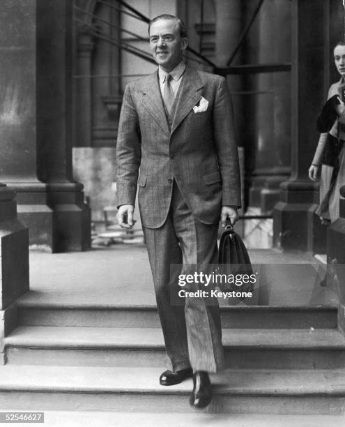 British statesman Sir Stafford Cripps leaves the Foreign Office in London after visiting Anthony Eden, 12th June 1941. He has briefly returned from...