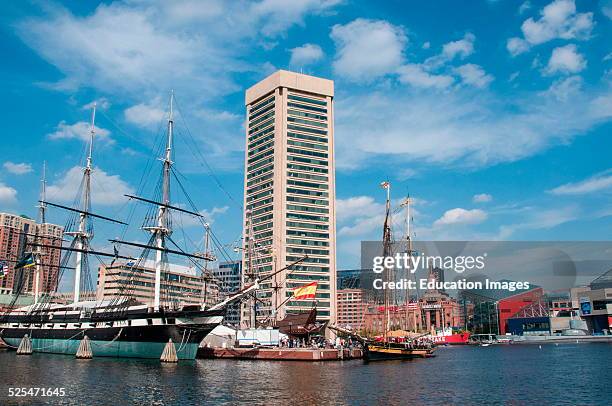 Constellation and Pride of Baltimore sailing ships tied up in Baltimore harbor, Maryland.