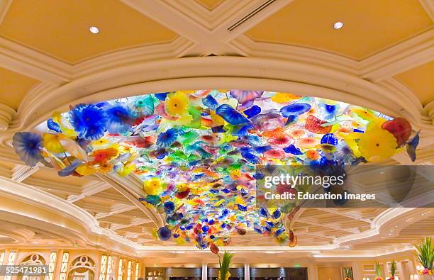 Glass Flowers Created By The Artists Dale Chihuly Is Installed In The Ceiling Of The Bellagio Hotel And Casino, Las Vegas, Nevada .
