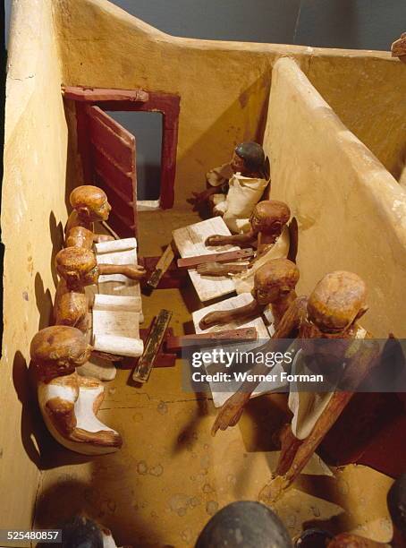 Wooden model depicting a granary. The scribes recording the produce, Egypt. Ancient Egyptian, 11th dynasty c.2134-1991 BC. Deir El-Bahri, tomb of...