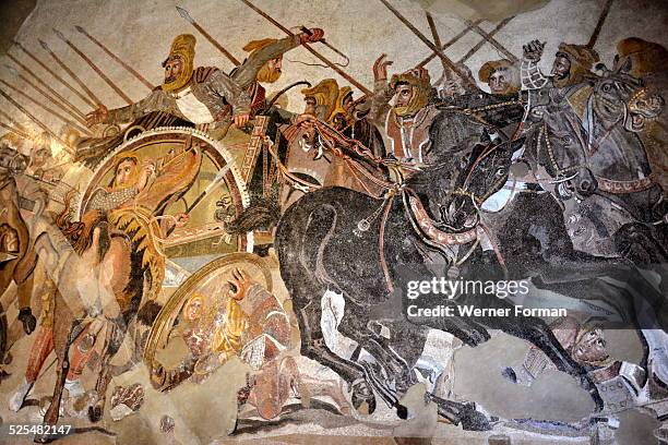 Mosaic from the House of the Faun, depicting the Battle of Issus . Detail of Darius III of Persia in his chariot. The charioteer is trying to control...