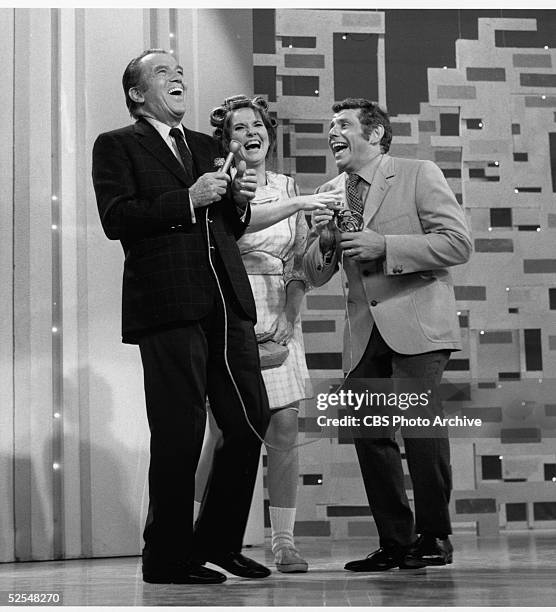 American variety show host Ed Sullivan throws his head back in laughter with comedy team Stiller & Meara, New York, New York, June 15, 1969.