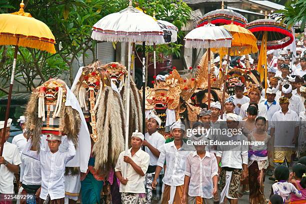 Barong Costume And Lion Masks Used In Traditional Legong Dancing Are Carried During A Hindu Procession For A Temple Anniversary, Ubud, Bali.