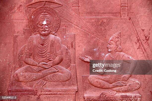 Bhagavad Gita engraved on a Hindu temple dialogue between Krishna and Arjuna.