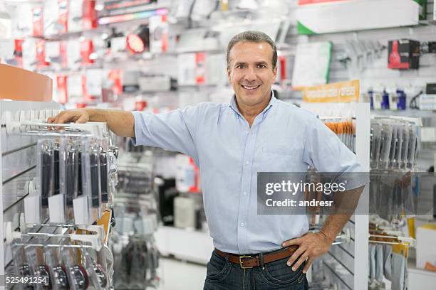 business manager running a tech store - shop seller stock pictures, royalty-free photos & images