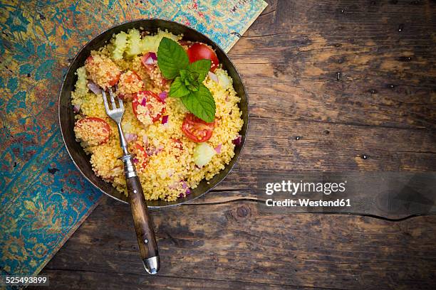 taboule, couscous salad with tomato, cucumber, red onion and peppermint - クスクス ストックフォトと画像