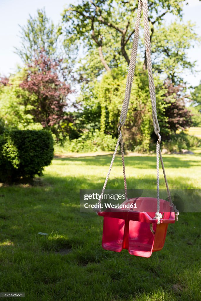 Children's swing in a garden