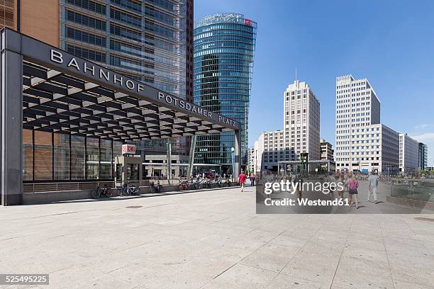 germany, berlin, view to bahntower, beisheim center and railway station at potsdam square - städtischer platz stock-fotos und bilder