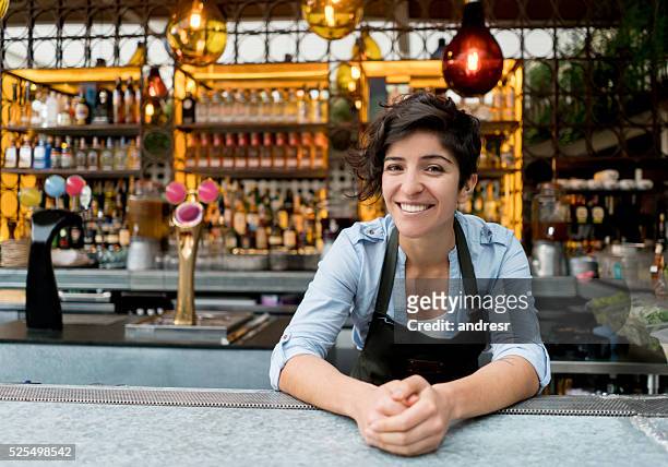 barman working at a bar - woman in a restorant stock pictures, royalty-free photos & images