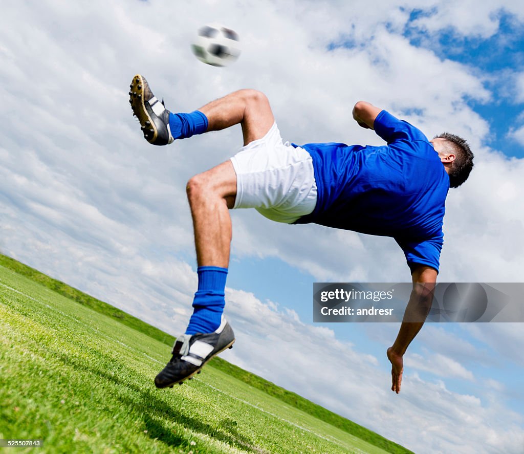 Football player kicking the ball