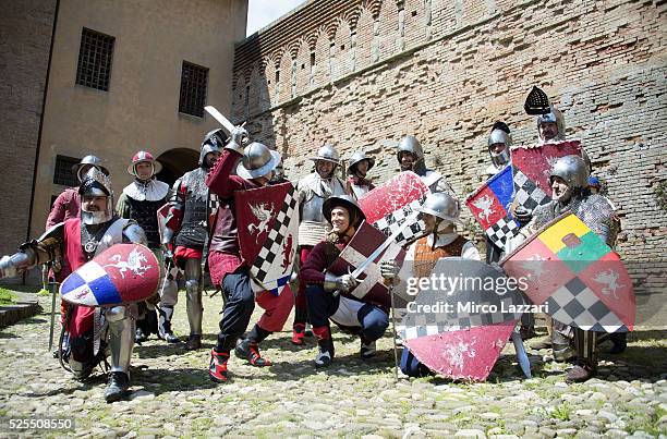 The WSBK riders pose and joke during the pre-event "Historic Duel and Archery Shooting Competition" at the Rocca Sforzesca in Imola during the World...