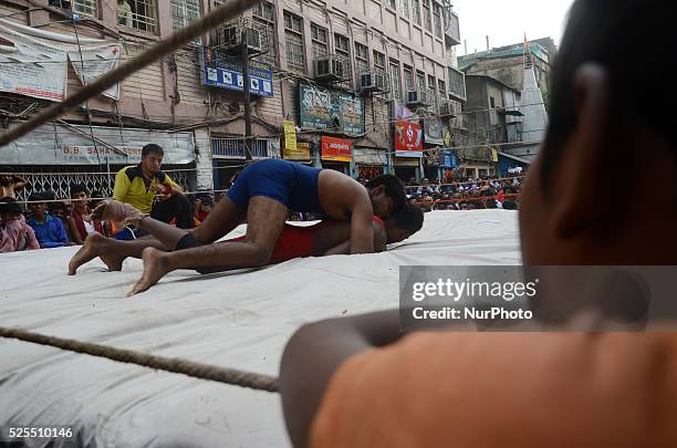 Streetside wrestling competition organised by the merchants of Burrabazar on the eve of Diwali festival in Burrabazar on 24th October 2014, in...