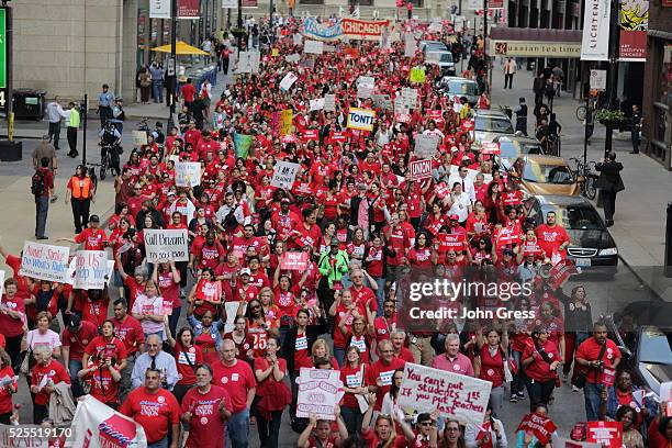 Thousands of Chicago Public School teachers march to the Board of Education's headquarters in protest in Chicago, May 23, 2012. Teachers say they are...