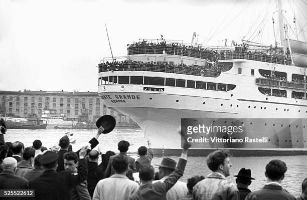 The Italian ship Conte Grande crowded with Italian emigrants leaving Genoa for Argentina.
