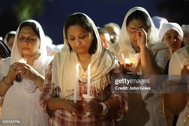 Sikh cries during a vigil in Oak Creek, Wisconsin, on August 7, 2012. A gunman killed six people and critically wounded three at a Sikh temple in an...