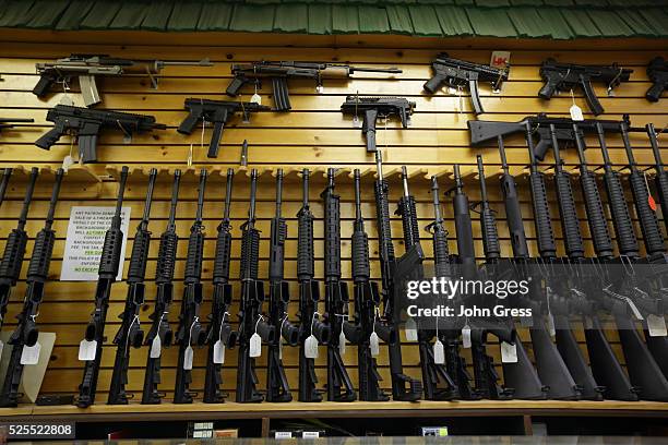 Assault rifles, some automatic, can been seen at the Shooters Shop in West Allis, Wisconsin, on August 7 the same store where alleged gunman Wade...