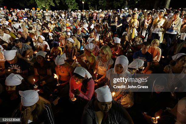 Sikhs attend a vigil in Oak Creek, Wisconsin, on August 7, 2012. A gunman killed six people and critically wounded three at a Sikh temple in an...