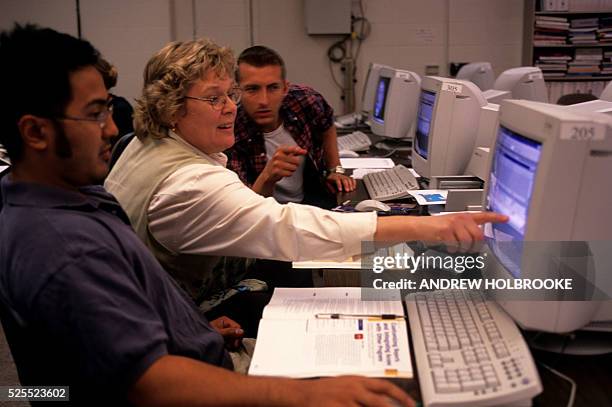 Instructors Taking Computer Class College Students In Computer Lab Photos and Premium High Res Pictures ...
